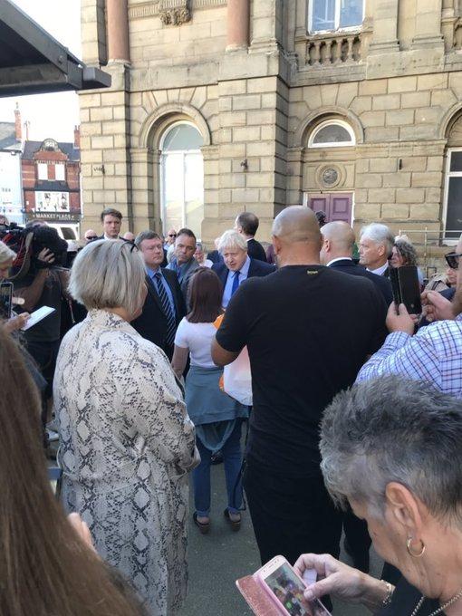 The PM gets a grilling from a resident in Doncaster market