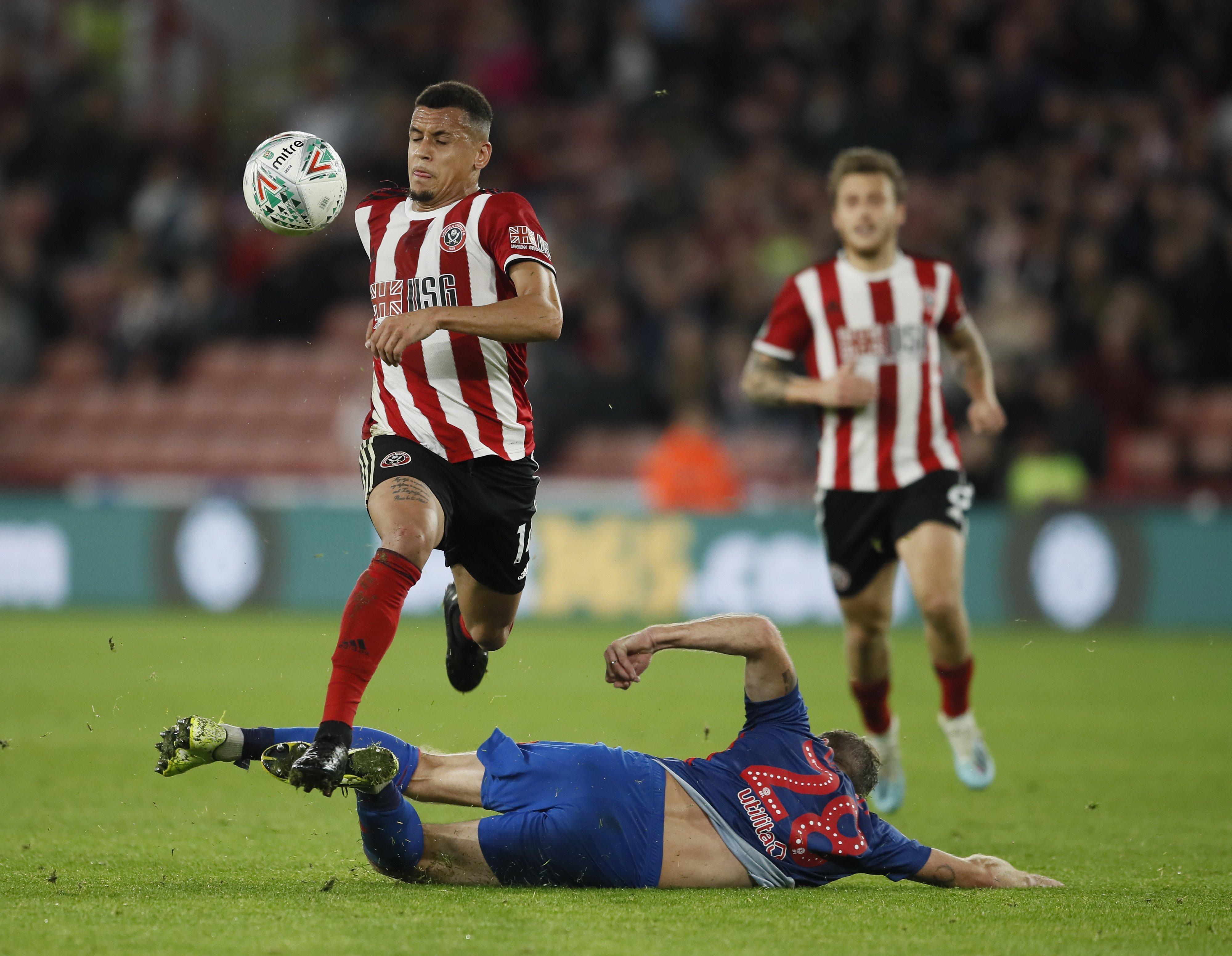 Ravel Morrison of Sheffield Utd skips past Laurens De Bock of Sunderland during the Carabao Cup match at Bramall Lane: Simon Bellis/Sportimage