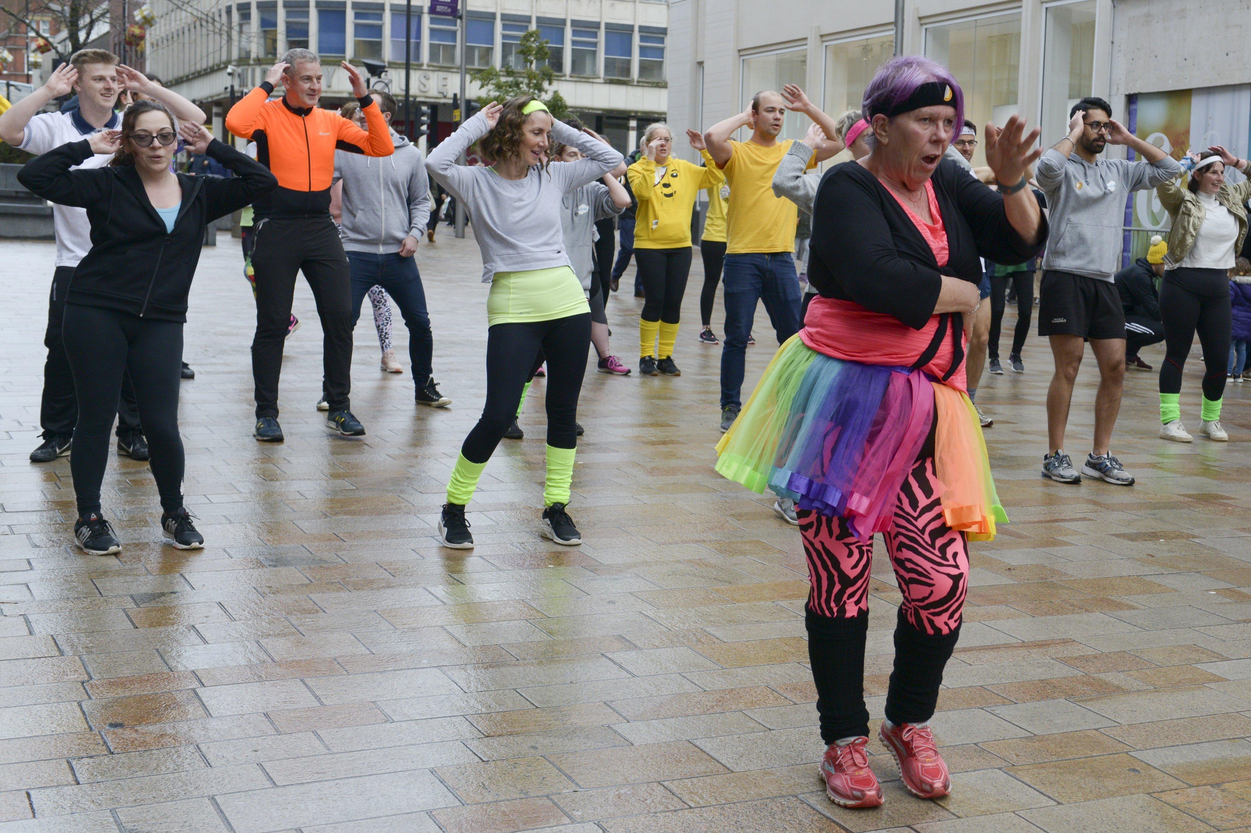 Sheffield city centre shoppers dazzled by 80s-style fitness flash mob in aid of Children in Need - The Star