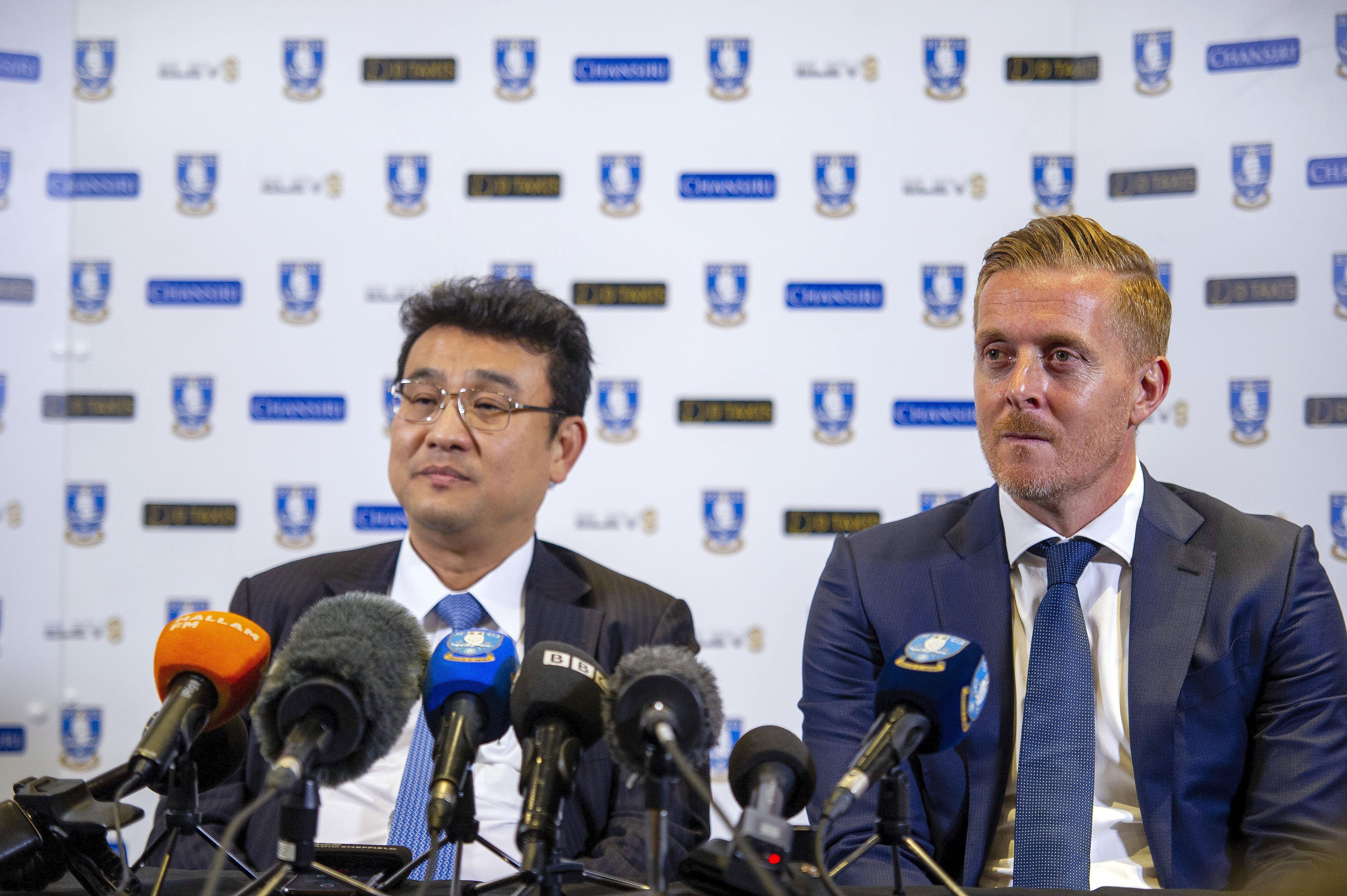 Dejphon Chansiri, left, and Garry Monk. Picture Scott Merrylees