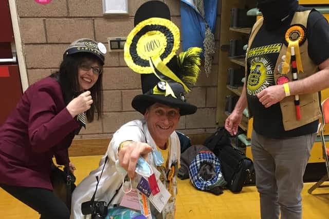 Centre, Official Monster Raving Loony Party candidate Nick Delves with party supporters. 