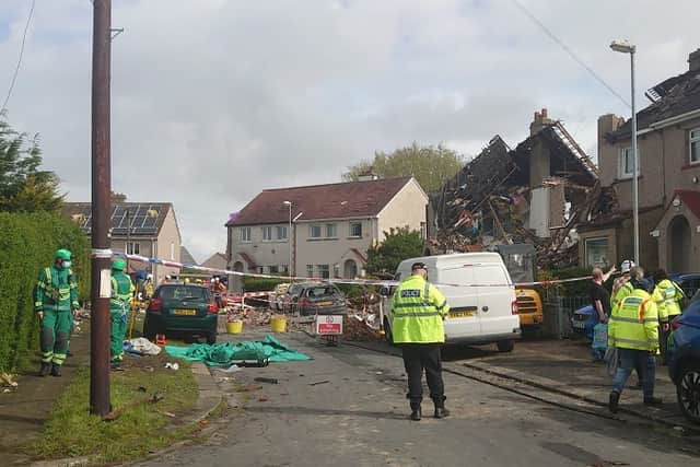 Lancashire Fire said on Twitter that 10 units were called to the terraced row and firefighters were searching a collapsed property.