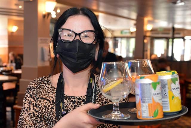 Table service: Dawn Sales takes drinks to a table in Chesterfield’s Spa Lane Vaults.