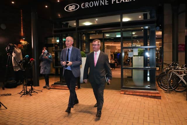 Gregory Campbell and Jeffrey Donaldson pictured leaving the hotel on Thursday evening. (Photo: Kelvin Boyes / Press Eye) 
