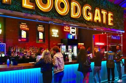 The Floodgate in Birmingham has curling & batting cages. The venue has a 4.6 rating from 832 reviews. One review read: “Great venue, good vibe & lots of options to enjoy, good selection of drinks.”