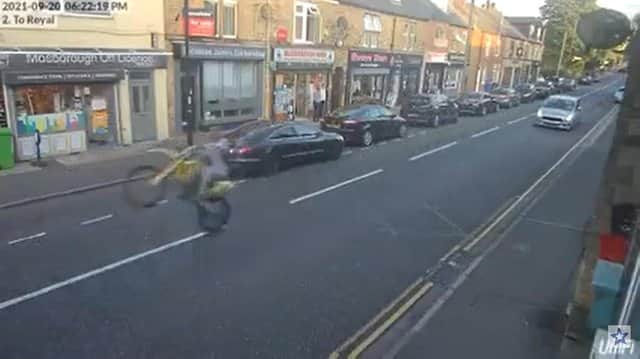 The motorcyclists did a wheelie as they drove up Mosborough High Street.