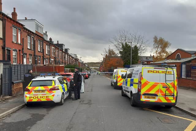 The scene on Harlech Road in Beeston after a man’s body was found.