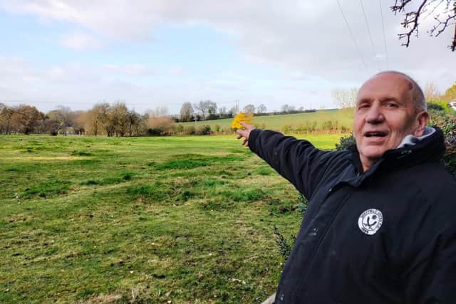 Homeowner Andrew Challoner points to the path HS2 would have carved through the field 300 yards from his home in Worksop Road.