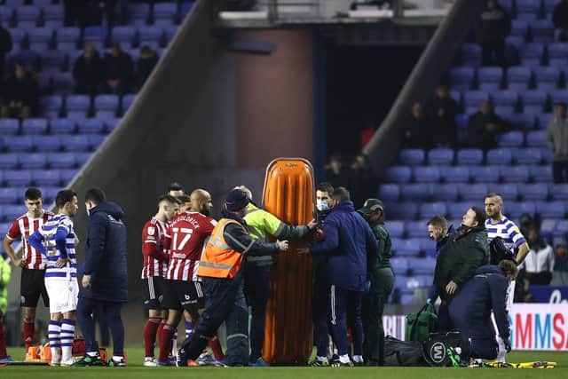 John Fleck of Sheffield United received medical treatment on the pitch at Reading, but has now been discharged from hospital (Photo by Ryan Pierse/Getty Images)
