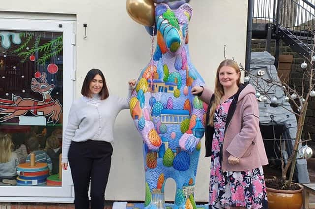 The Star's Bear of Sheffield at it's new home at Corner House Nursery. Nancy Fielder, editor of The Star, right, made a visit to the nursery.
