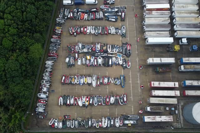A view of one of two areas now being used at a warehouse facility in Dover, Kent, for boats used by people thought to be migrants. The boats are stored following being intercepted in The Channel by Border Force as attempts to make the crossing continue (image: PA)