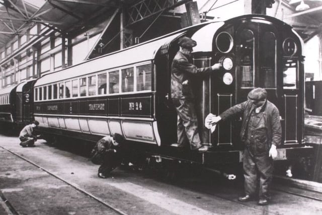 Subway cars in the process of conversion to electric service in 1935. 