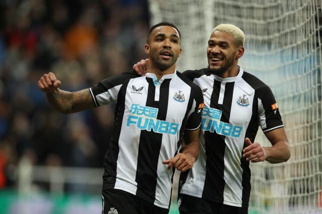 Callum Wilson of Newcastle United celebrates with team mate Jolinton after he scores the only goal of the game during the Premier League match between Newcastle United and Burnley.