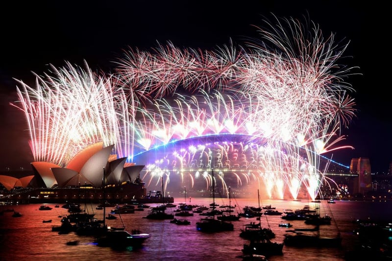 New Year’s Eve fireworks light up the sky over Sydney’s iconic Harbour Bridge and Opera House