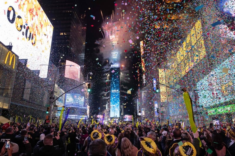 Confetti flies in the air at Times Square on New Year’s Eve in New York City on December 31 2021