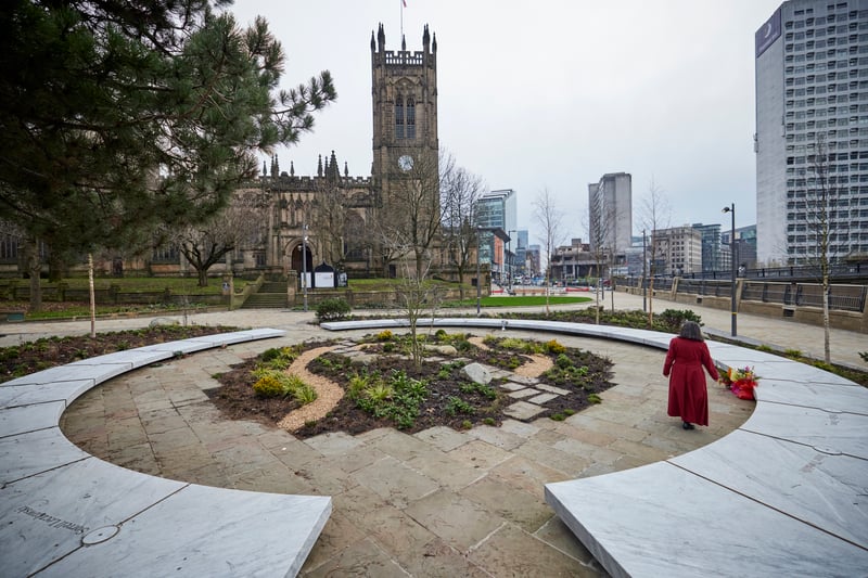 A woman explores the memorial garden