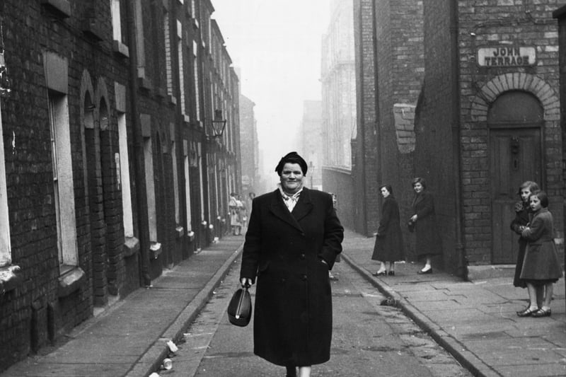 British Labour Party politician Bessie Braddock, MP for the Liverpool Exchange division, in the old streets around Lime Street.
