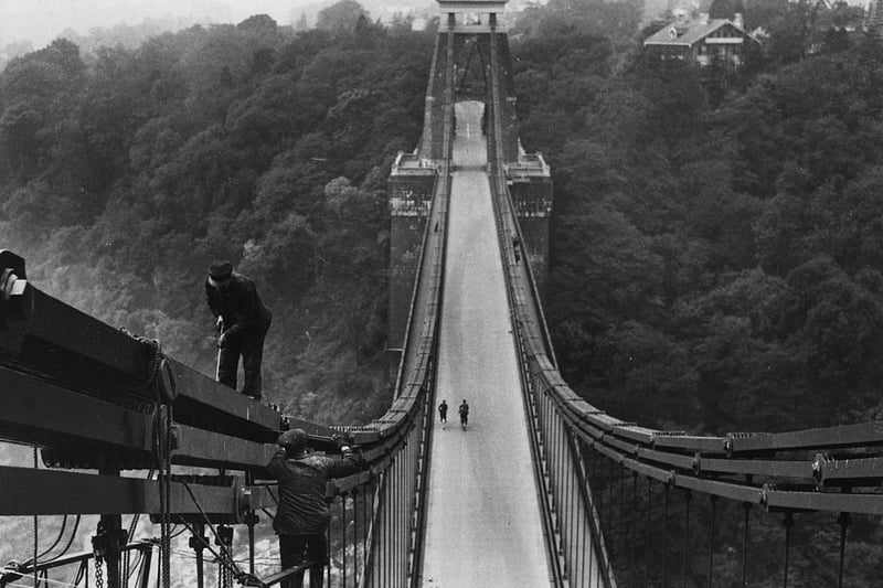 Don’t look down: Work to paint the bridge takes place on May 29, 1936. Tolls were used to pay for the upkeep of the bridge. (Photo by Fox Photos/Getty Images)
