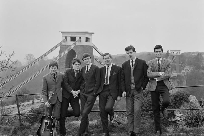1960s group The Echos pose together in front of the bridge on March 2 1965.  Band members include Bob Pritchard, Tony Sweet, Peter Ross, Tony Searles, Dave Bateman and Vic Thomasson. (Photo by Ron Moran/Daily Express/Hulton Archive/Getty Images)