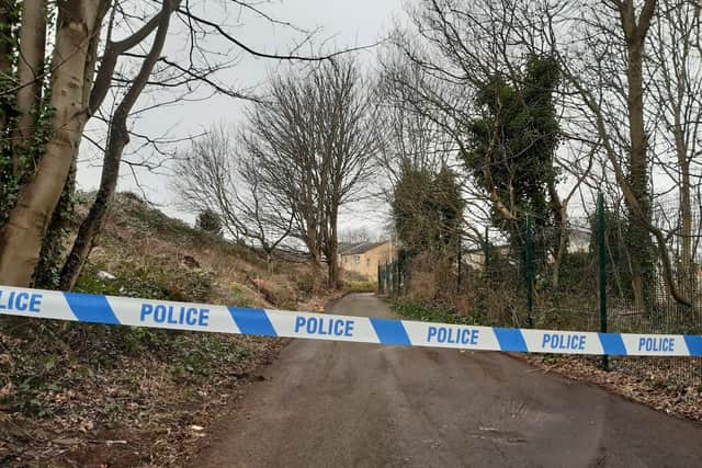 The police cordon in place Carr Bottom Road. 