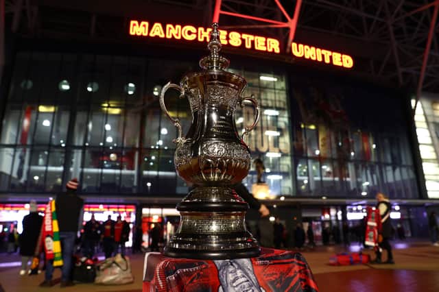 Replica FA Cup trophy outside Old Trafford. Credit: Getty.