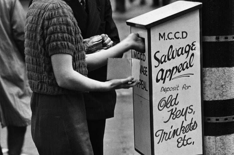 A collection point on the corner of a Manchester street to aid the wartime scrap campaign in 1940. 