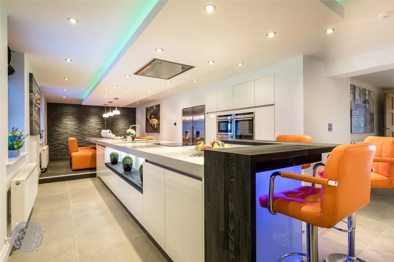 The stunning modern kitchen area.