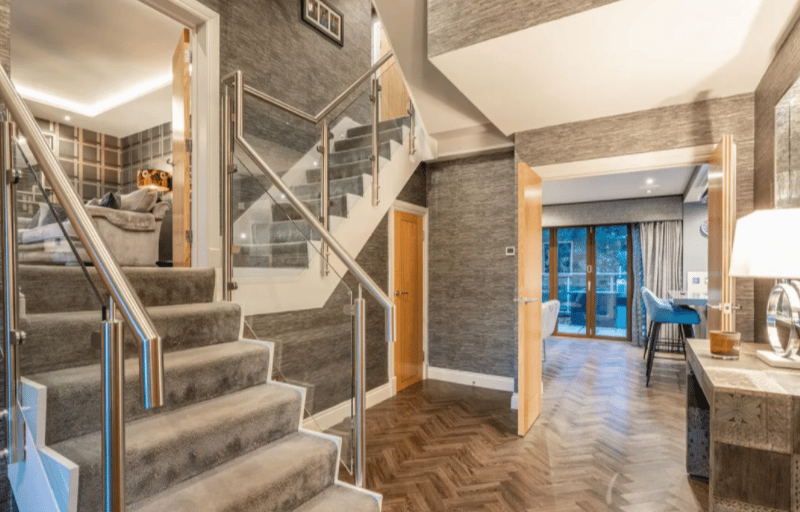 This modern stairway was too good not to include, the glass banister is stunning. 
