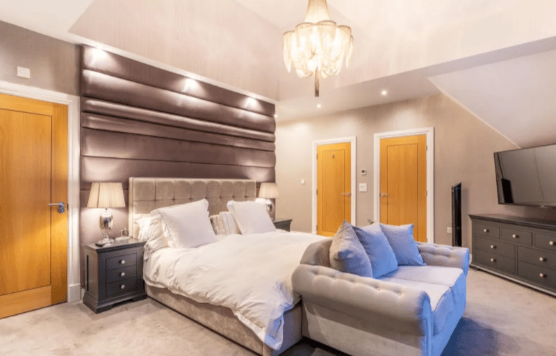 This spacious bedroom comes with great storage and an en suite.