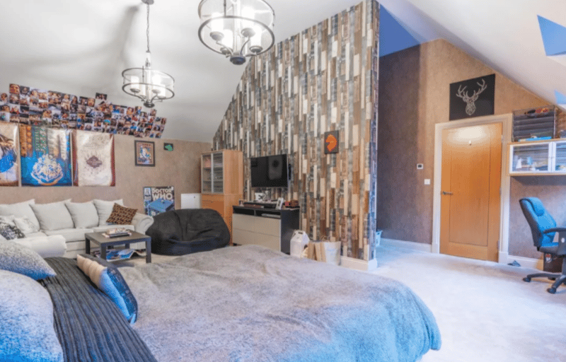 This converted bedroom is a huge space for a guest or master bedroom.