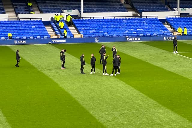 Leeds United’s players check out the Goodison Park pitch.