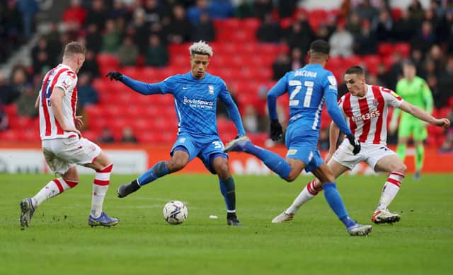 Lyle Taylor, of Birmingham City, on the ball during the Sky Bet Championship match between Stoke City and Birmingham City at Bet365 Stadium on February 19, 2022.