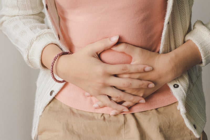Feeling bloated or having a swollen tummy is one of the key signs of ovarian cancer and can occur frequently. If you experience bloating up to 12 times or more per month, you should see your GP.