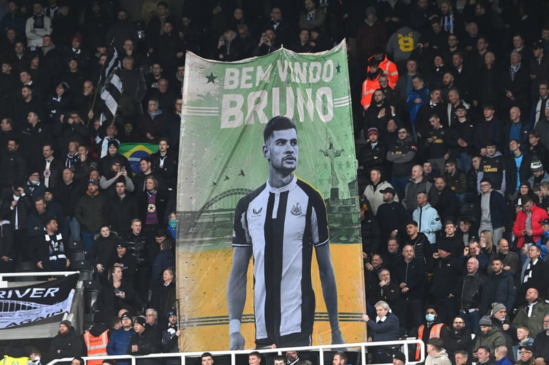 A flag in the Gallowgate end welcomes Newcastle player Bruno Guimaraes to Newcastle ahead of a crucial relegation clash against Everton last season.
