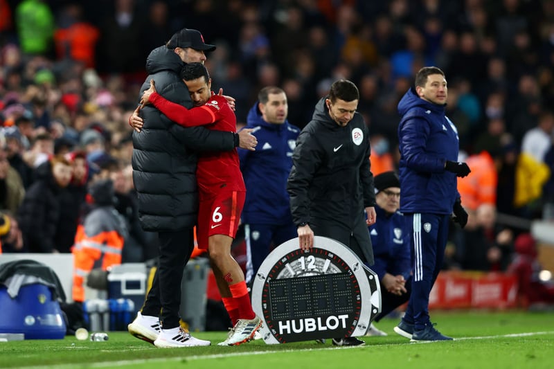 Jurgen Klopp embraces Thiago Alcantara as the midfielder makes way for skipper Jordan Henderson. The Spain international completed 93% of his passes against Leeds. (Photo by Clive Brunskill/Getty Images)