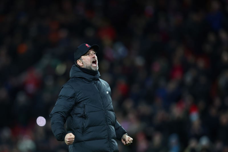 Klopp celebrates wildly after watching his side put in a superb display that moves them to within three points of Man City at the top of the table. (Photo by Clive Brunskill/Getty Images)
