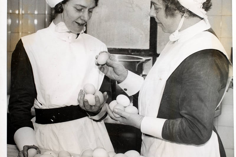 Two nurses counting the eggs received at the Manchester Northern Hospital during its appeal for 20,000 eggs, England, 4th April 1936. The eggs are not all wanted at once but a special appeal is being made for Easter