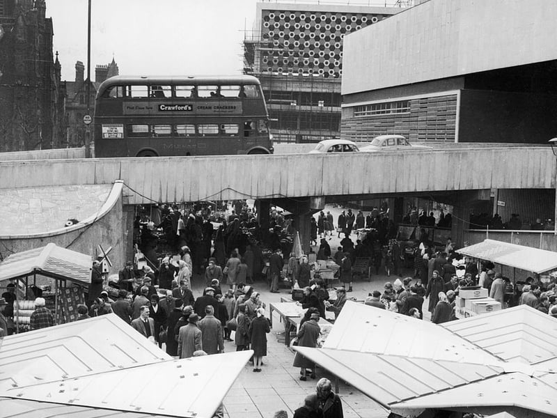 The flyover opens at the Bull Ring Market in 1963. The Bull Ring Centre is under construction to the right