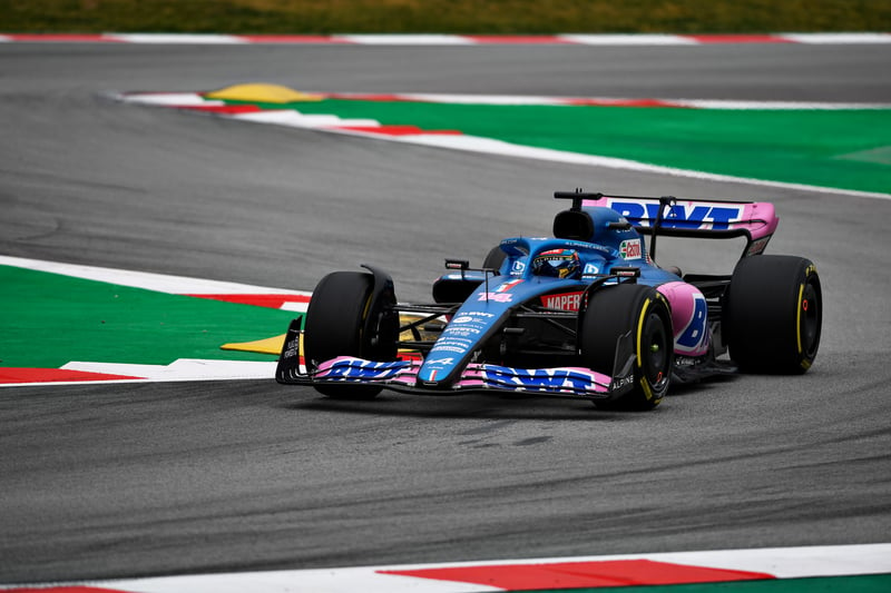Drivers for 2022: Fernando Alonso and Esteban Ocon  Alpine’s A522 has chosen a blue and pink livery for 2022 after teaming up with BWT as its title sponsor.  Lauren Rossi became Alpine Cars CEO in January 2021 and has completely reworked the team’s management and power unit.  Former Peugeo motorsport boss, Bruno Famin has taken control of the Alpine engine facility.  Alpine’s power unit package is now a far more aggressive design as Renault have been working on a switch to the split turbo concept, originally pioneered by Mercedes and adopted by Honda in 2017.  If Alpine does not progress with their new designs and power, Fernando Alonso may be starting his final season in F1…again. 
