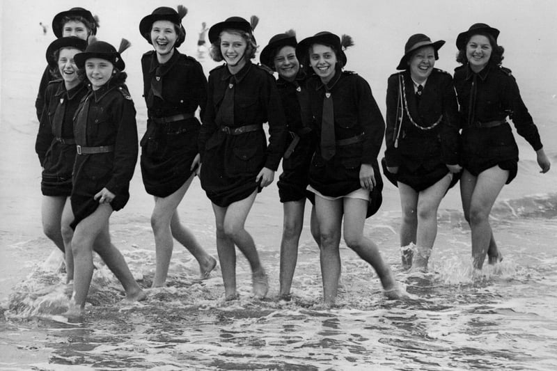 Girls of the 7th Manchester Regiment Church Girls Brigade (Rochdale Battalion) who are in camp at Bridlington, making the most of their holiday by the sea, 25th August 1939.