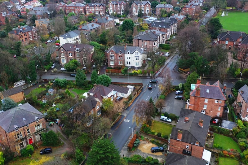 Aerial view over suburban homes and roads in Birkenhead, Wirral. (Credit: Adobe)