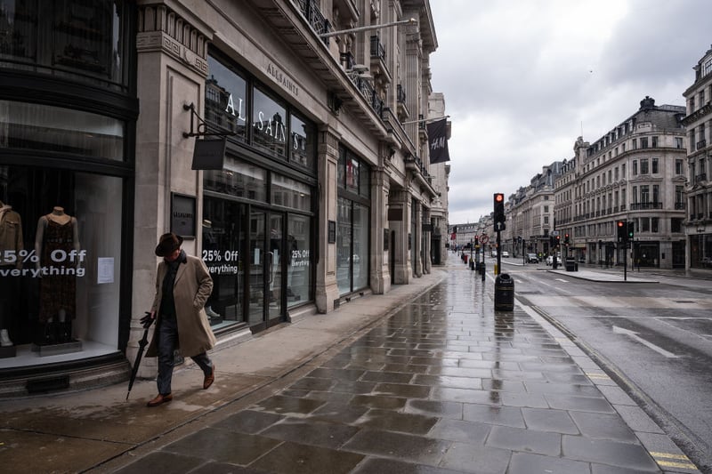 One single person walks along an almost deserted Regent Street during the first lockdown. Photo by Leon Neal/Getty Images)