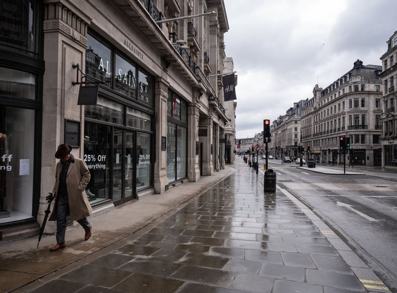 One single person walks along an almost deserted Regent Street during the first lockdown. Photo by Leon Neal/Getty Images)