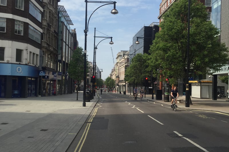 A single cyclist is the only traffic on Oxford Street during the first lockdown.