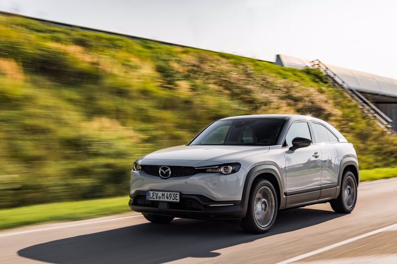 The MX-30 is Mazda’s first attempt at a production EV and, as with many Mazda products, takes a slightly unusual approach. Besides the rear-hinged rear doors and the cork interior panels, the compact SUV also bucks the trend for big batteries and range, offering just 124 miles from its 35.5kWh battery.
