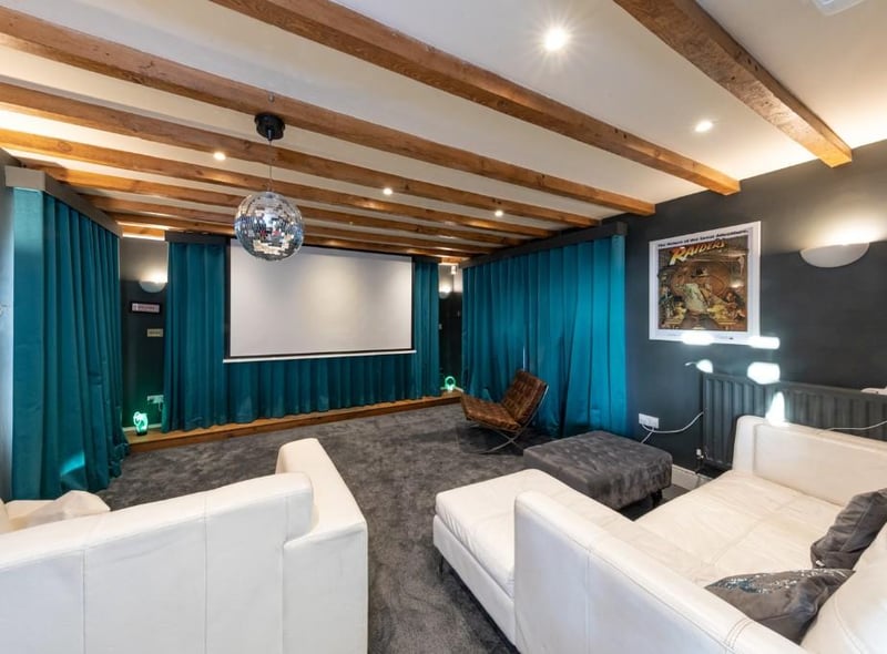 There’s so much of the house that will have your eyes on springs, including this cinema room. (Image: Rightmove)