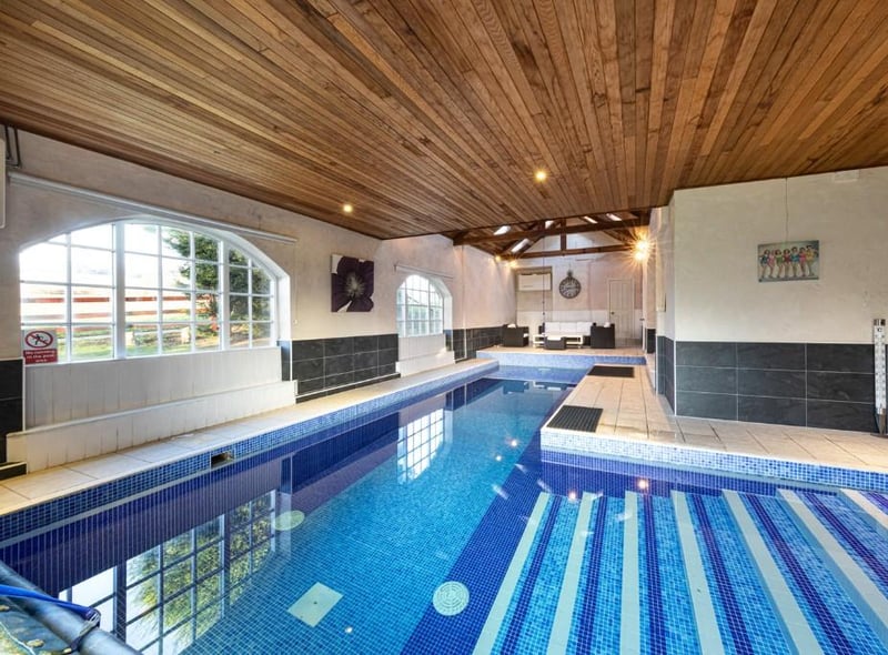 There are plenty more living spaces and bedrooms to showcase, but Hampstead House also has a pool which looks just perfect. (Image: Rightmove)