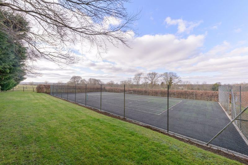 The house has 11.2 acres and a tennis court to boot. (Image: Rightmove)