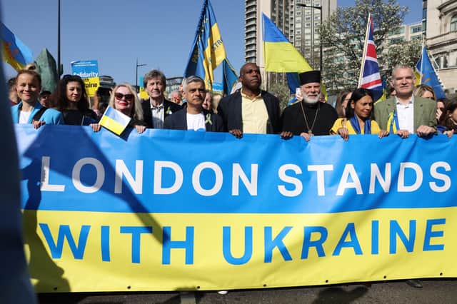 London mayor Sadiq Khan and Labour shadow foreign secretary David Lammy walked behind a Ukrainian flag. Photo: Getty