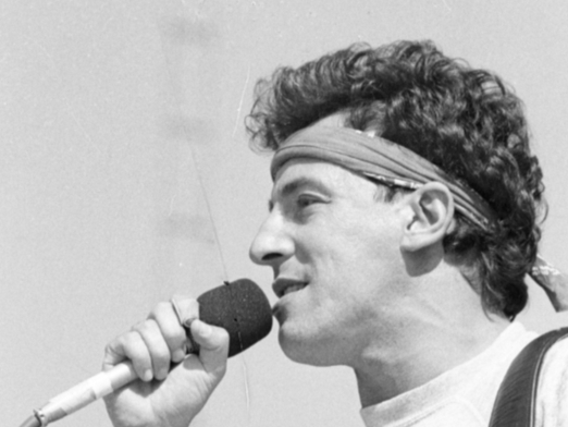 Bruce Springsteen performed on an open air stage in July 1985. 80,000 adoring fans came to see the American rock singer perform in Leeds. 